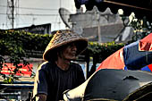 Riding the becak, the local cycle rickshaws in Malioboro street Yogyakarta. 